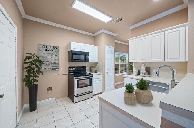 kitchen featuring white cabinets, ornamental molding, stainless steel electric range, a sink, and black microwave
