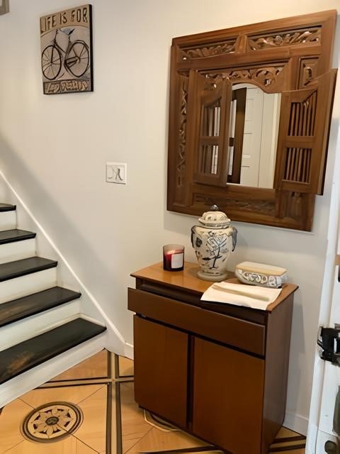 interior space featuring baseboards