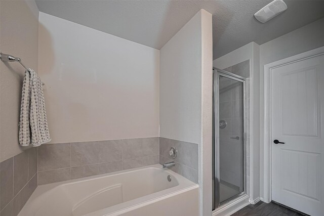 515 Green Clover Ln, Rosharon, TX 77583 - bathroom featuring a bath and a shower stall
