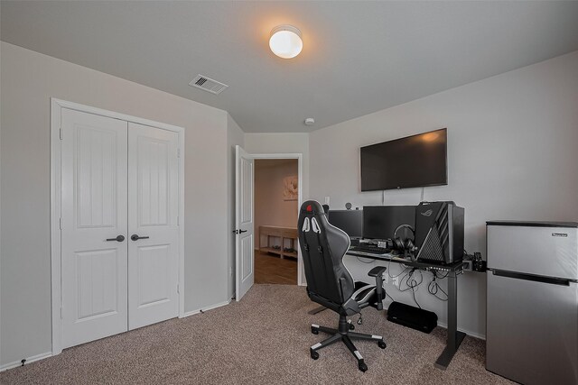 515 Green Clover Ln, Rosharon, TX 77583 - home office featuring carpet floors, visible vents, and baseboards