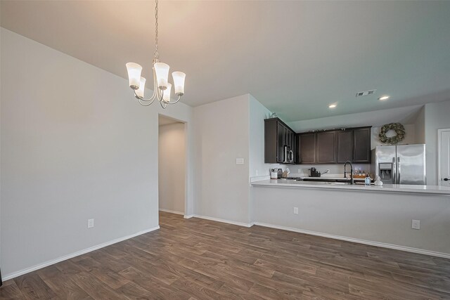 515 Green Clover Ln, Rosharon, TX 77583 - kitchen featuring light countertops, dark wood finished floors, visible vents, and appliances with stainless steel finishes