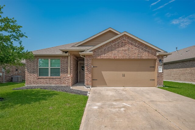 515 Green Clover Ln, Rosharon, TX 77583 - ranch-style home featuring a front lawn, cooling unit, concrete driveway, brick siding, and a garage