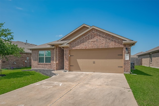 515 Green Clover Ln, Rosharon, TX 77583 - ranch-style house with fence, a front lawn, driveway, brick siding, and a garage