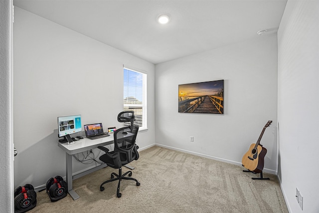 home office featuring baseboards and carpet floors