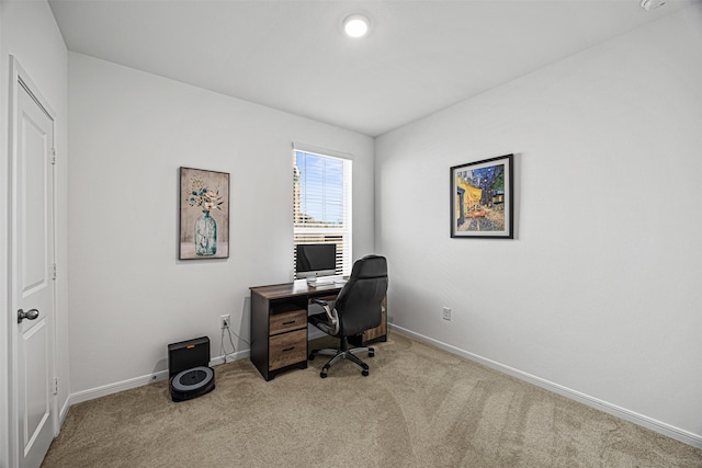 office space featuring baseboards and carpet flooring