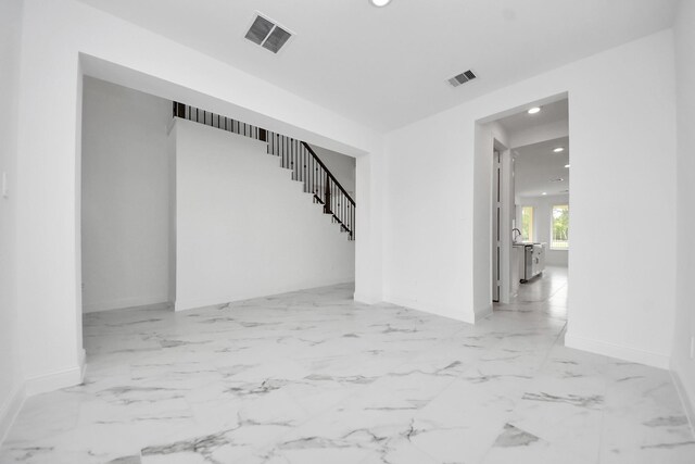 15607 Boulder Lake Ln, Conroe, TX 77302 - interior space featuring visible vents, baseboards, and recessed lighting