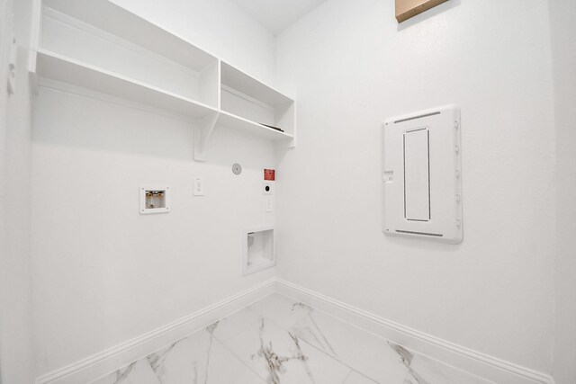 15607 Boulder Lake Ln, Conroe, TX 77302 - laundry room featuring laundry area, gas dryer hookup, hookup for an electric dryer, baseboards, and marble finish floor