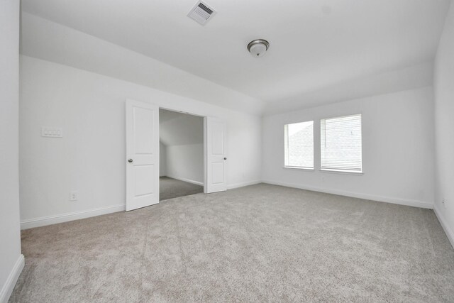15607 Boulder Lake Ln, Conroe, TX 77302 - unfurnished bedroom featuring carpet, baseboards, and visible vents