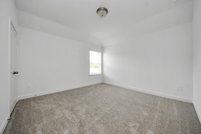 15607 Boulder Lake Ln, Conroe, TX 77302 - empty room with carpet flooring and baseboards