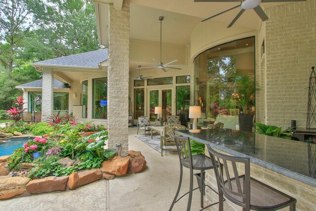 17511 Seidel Rd, Tomball, TX 77377 - view of patio with a ceiling fan and an outdoor pool