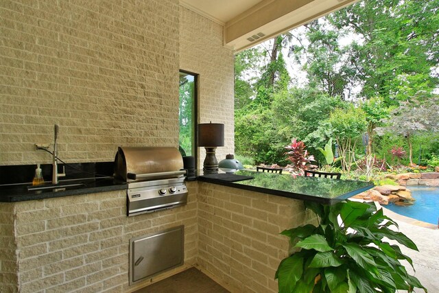17511 Seidel Rd, Tomball, TX 77377 - view of patio / terrace featuring visible vents, exterior kitchen, area for grilling, and outdoor wet bar