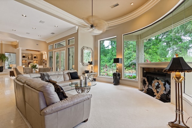 17511 Seidel Rd, Tomball, TX 77377 - living area featuring a fireplace with flush hearth, recessed lighting, visible vents, a ceiling fan, and ornamental molding