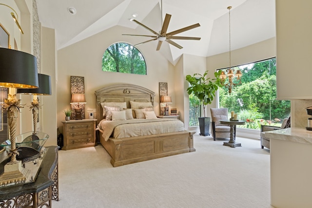 17511 Seidel Rd, Tomball, TX 77377 - bedroom featuring carpet floors, high vaulted ceiling, and ceiling fan with notable chandelier