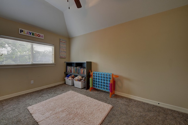 game room with a ceiling fan, lofted ceiling, carpet floors, and baseboards