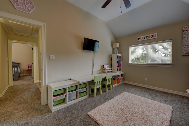 recreation room with vaulted ceiling, attic access, ceiling fan, and carpet