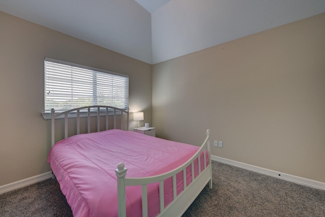 bedroom with baseboards, carpet floors, and vaulted ceiling