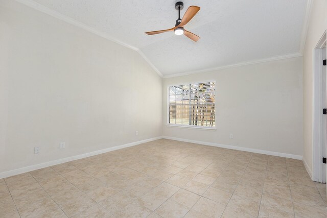 5442 Garden Village Dr, Kingwood, TX 77339 - empty room featuring a textured ceiling, light tile patterned flooring, vaulted ceiling, a ceiling fan, and ornamental molding