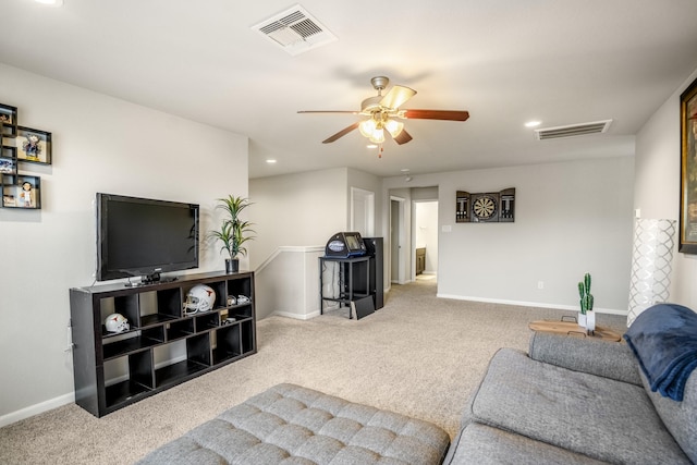 carpeted living area with ceiling fan, baseboards, visible vents, and recessed lighting