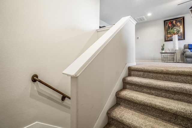 stairs featuring visible vents and recessed lighting