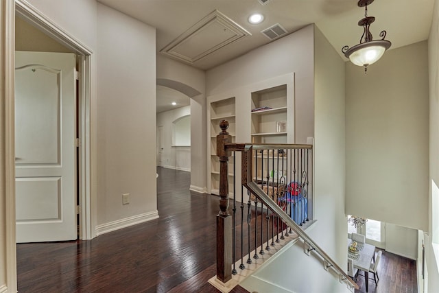 21411 Fairhaven Creek Dr, Cypress, TX 77433 - corridor featuring an upstairs landing, built in features, hardwood / wood-style floors, arched walkways, and recessed lighting