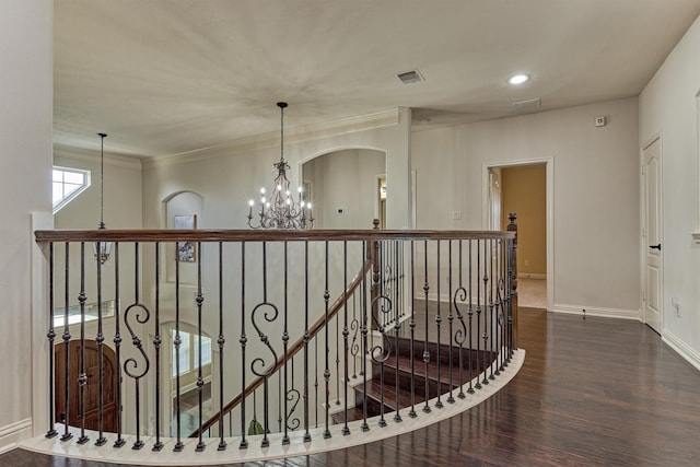 21411 Fairhaven Creek Dr, Cypress, TX 77433 - corridor featuring a chandelier, wood finished floors, an upstairs landing, baseboards, and crown molding
