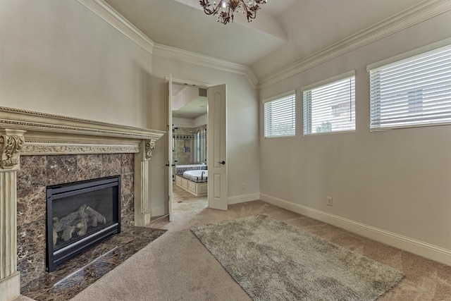 21411 Fairhaven Creek Dr, Cypress, TX 77433 - unfurnished living room with carpet floors, baseboards, a fireplace, ornamental molding, and a chandelier