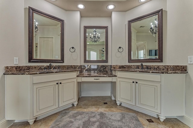 21411 Fairhaven Creek Dr, Cypress, TX 77433 - full bath with two vanities, crown molding, tile patterned flooring, and recessed lighting