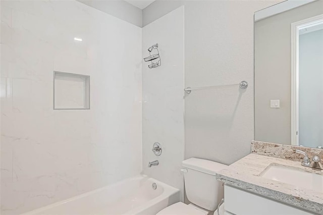 full bathroom featuring vanity, shower / tub combination, and toilet