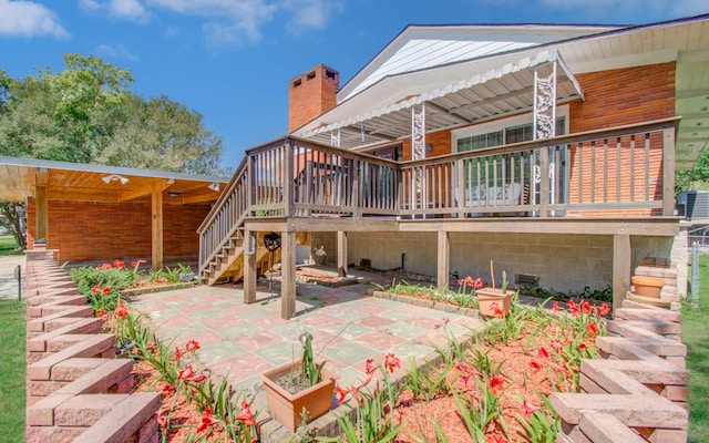15708 Acapulco Dr, Jersey Village, TX 77040 - back of property with a patio area, stairs, and a deck