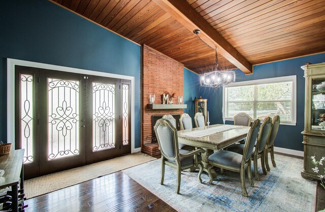 15708 Acapulco Dr, Jersey Village, TX 77040 - dining space with wooden ceiling, an inviting chandelier, french doors, and vaulted ceiling with beams