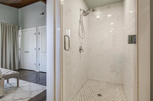 15708 Acapulco Dr, Jersey Village, TX 77040 - full bath with a shower stall, wood finished floors, and visible vents