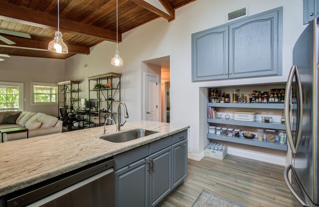 15708 Acapulco Dr, Jersey Village, TX 77040 - kitchen with stainless steel appliances, visible vents, a sink, pendant lighting, and wood ceiling