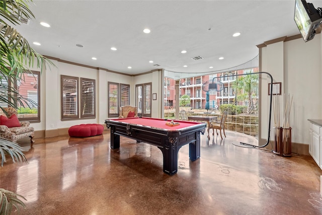 game room with a wealth of natural light, baseboards, visible vents, crown molding, and pool table