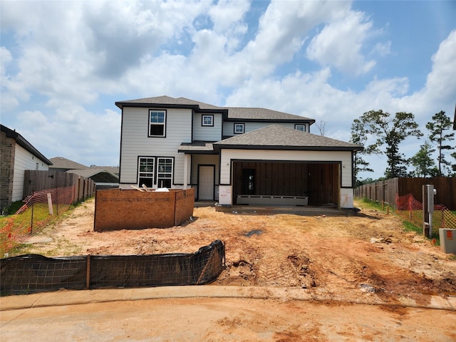 14200 Spring Valley Dr, Conroe, TX 77303 - view of front of property with a garage