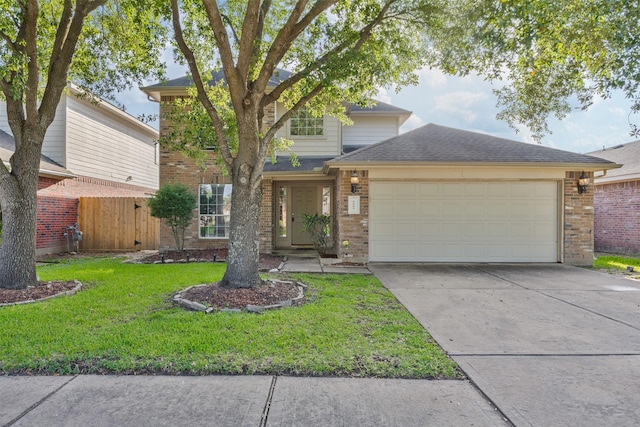 5903 Llano Creek Dr, Katy, TX 77449 - view of front of property with brick siding, an attached garage, driveway, and roof with shingles