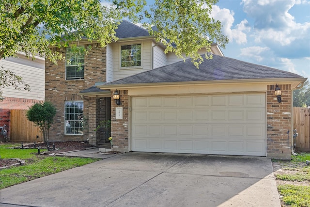 5903 Llano Creek Dr, Katy, TX 77449 - traditional-style home with driveway, a garage, brick siding, and roof with shingles