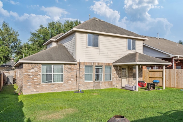 5903 Llano Creek Dr, Katy, TX 77449 - rear view of property featuring brick siding, roof with shingles, and cooling unit