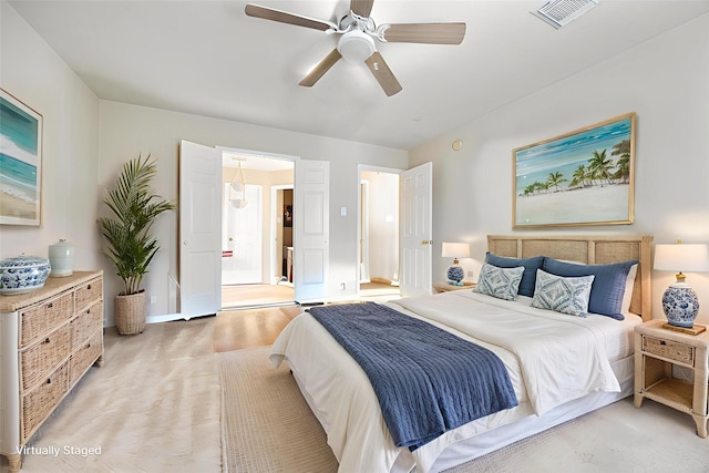 5903 Llano Creek Dr, Katy, TX 77449 - bedroom featuring baseboards, a ceiling fan, ensuite bathroom, and light colored carpet