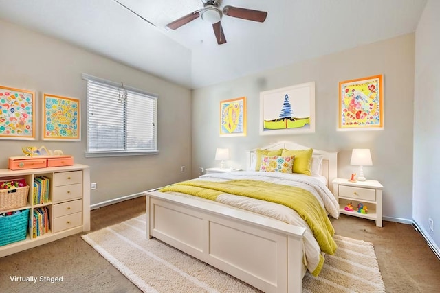 5903 Llano Creek Dr, Katy, TX 77449 - bedroom featuring light carpet, baseboards, and a ceiling fan