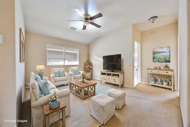 5903 Llano Creek Dr, Katy, TX 77449 - living room with ceiling fan, lofted ceiling, baseboards, and light carpet