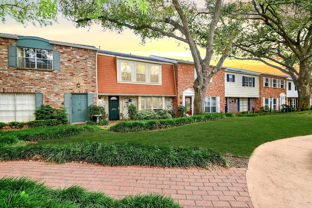 6415 Olympia Dr Unit 143, Houston, TX 77057 - townhome / multi-family property with brick siding and a front yard