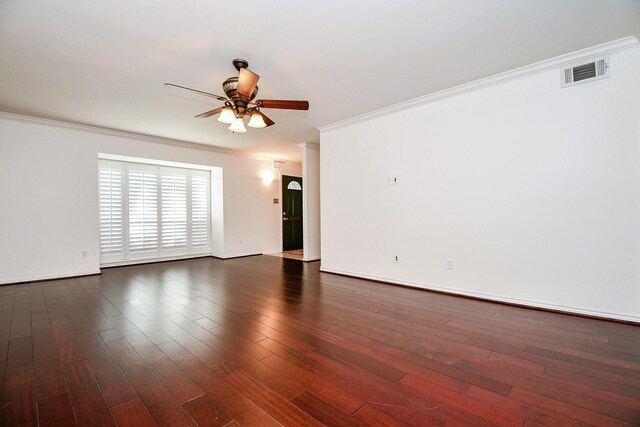 6415 Olympia Dr Unit 143, Houston, TX 77057 - empty room featuring crown molding, visible vents, a ceiling fan, and dark wood-style floors