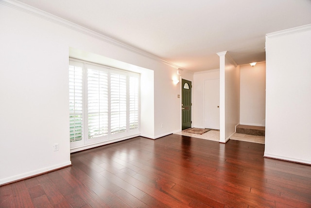 6415 Olympia Dr Unit 143, Houston, TX 77057 - spare room with hardwood / wood-style flooring, baseboards, and crown molding