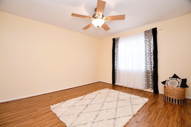 6415 Olympia Dr Unit 143, Houston, TX 77057 - unfurnished room with light wood-style flooring, baseboards, and ceiling fan