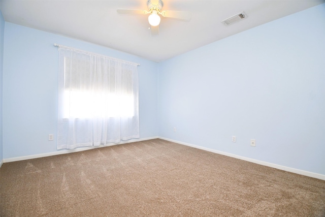 6415 Olympia Dr Unit 143, Houston, TX 77057 - unfurnished room featuring visible vents, carpet flooring, baseboards, and a ceiling fan