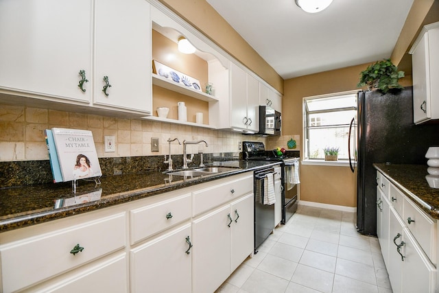 6415 Olympia Dr Unit 143, Houston, TX 77057 - kitchen with a sink, backsplash, white cabinetry, open shelves, and black appliances