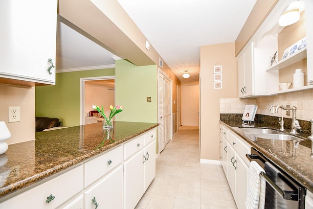6415 Olympia Dr Unit 143, Houston, TX 77057 - kitchen featuring open shelves, white cabinets, a sink, and dark stone countertops