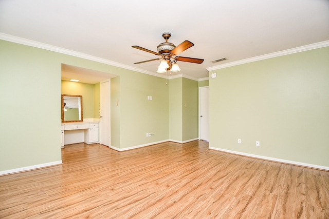 6415 Olympia Dr Unit 143, Houston, TX 77057 - unfurnished room featuring baseboards, light wood-style flooring, visible vents, and crown molding