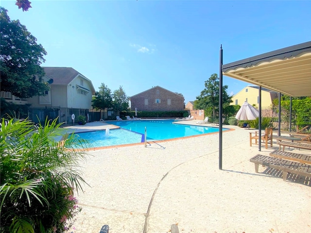 6415 Olympia Dr Unit 143, Houston, TX 77057 - community pool with fence and a patio area