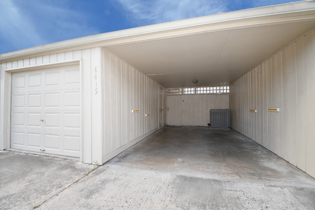 6415 Olympia Dr Unit 143, Houston, TX 77057 - garage featuring cooling unit